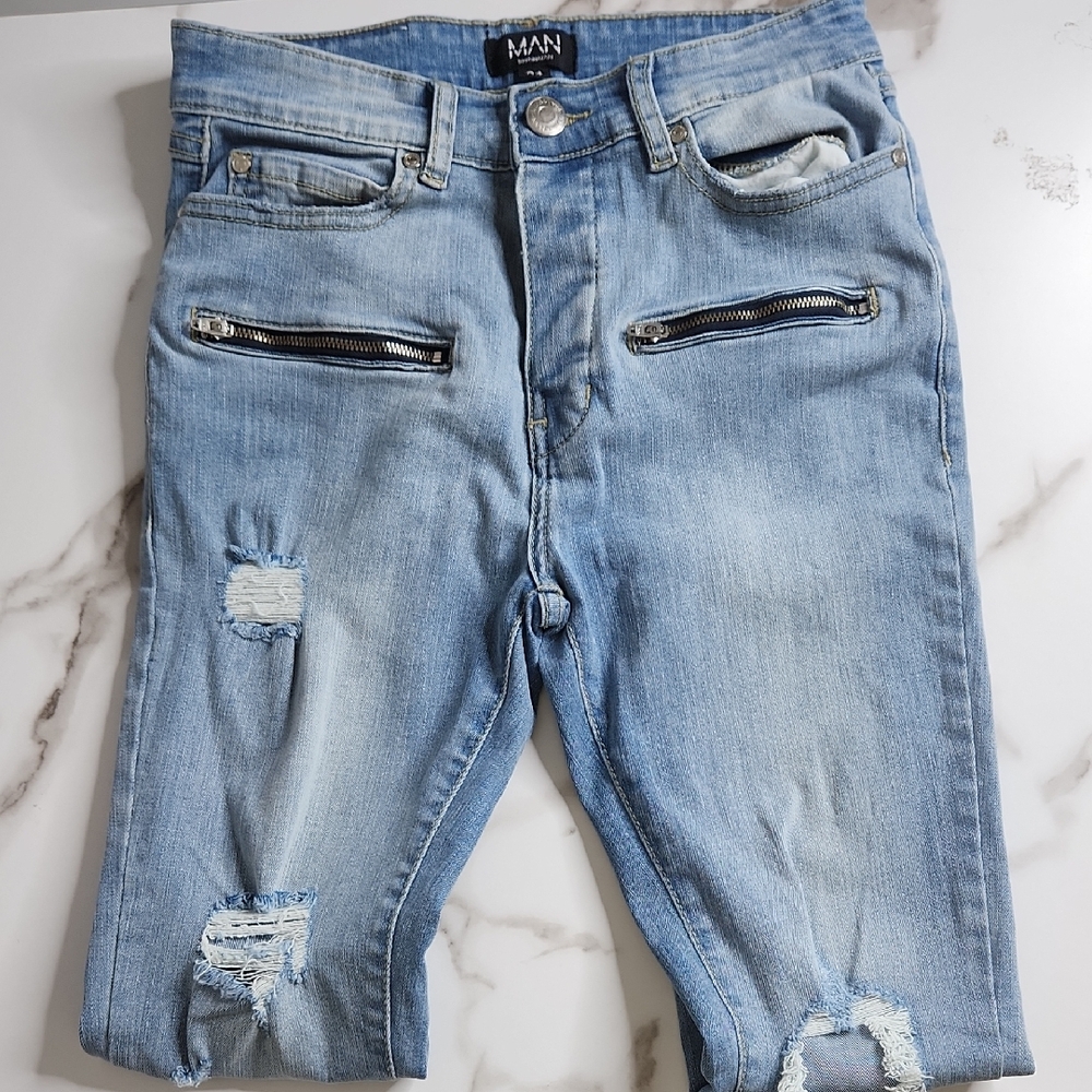 MAN Distressed Light Blue Skinny Jeans